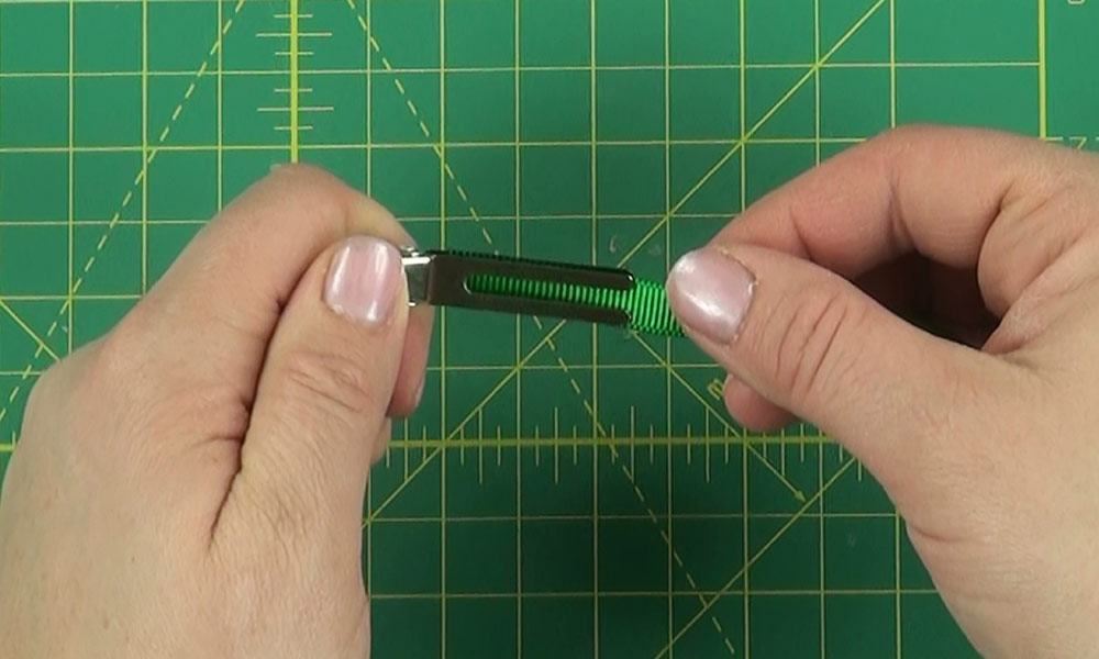 Woman making a Caterpillar Hair Clip