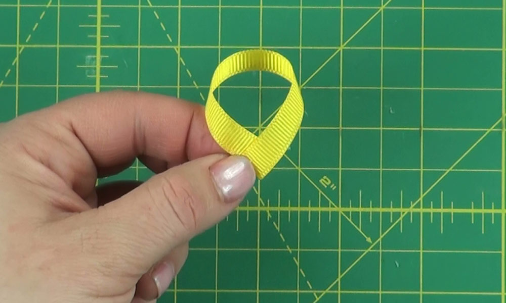 Woman making a Bumblebee Hair Clip