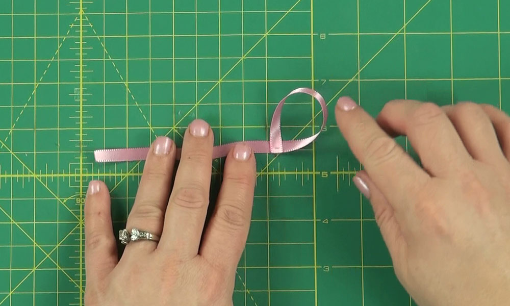 Woman making a Elephant Hair Clip