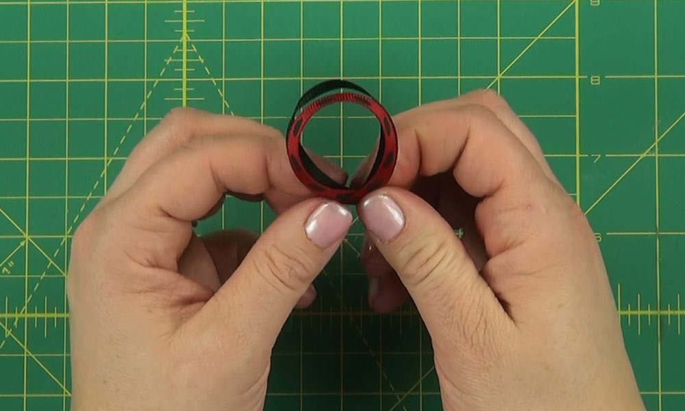 Woman making a Ladybug Hair Clip