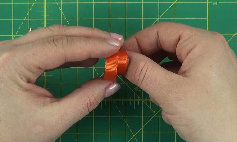 Woman making a Pumpkin Hair Clip