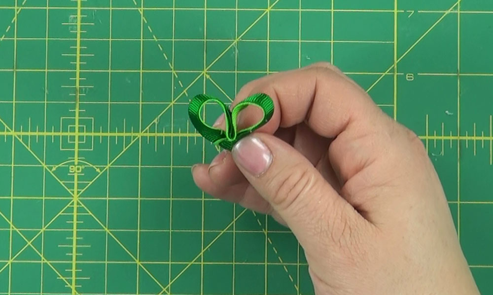 Woman making a Shamrock Hair Clip