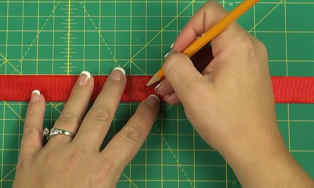 Woman making a Shoestring Bow