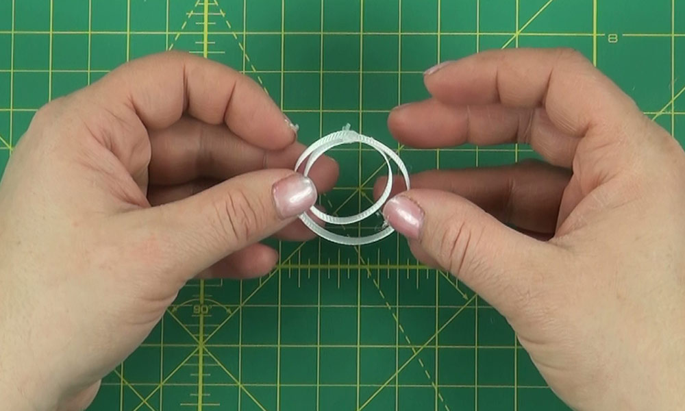 Woman making a Snowman Hair Clip